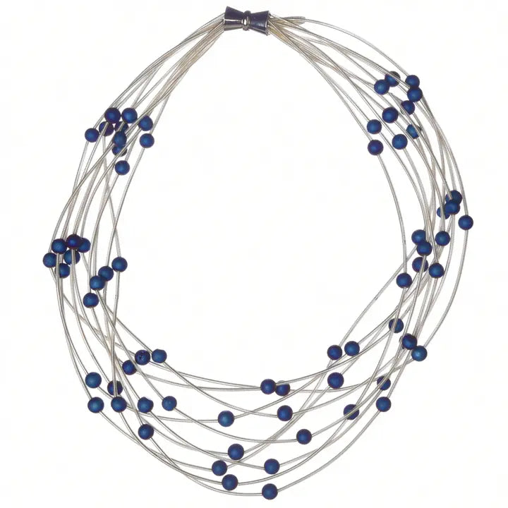 10 Layer white necklace with blue geo